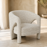 Perugia textured ivory accent chair in a premium Mediterranean interior