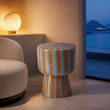 Pescara striped glossy pedestal side table in an elegant evening interior