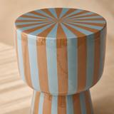 Close-up of the Pescara glossy caramel and pale aqua striped finish