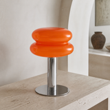 Alternate view of the Peyton orange glass and chrome table lamp
