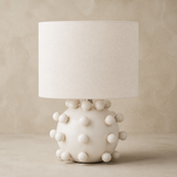 Pip ivory bobble ceramic table lamp in a warm beige Elara studio