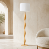 Priya natural wood floor lamp in a premium Mediterranean interior