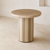 Rayas circular pedestal side table from an alternate angle