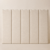 Close-up of Riviera Queen ivory woven upholstery and panel seams