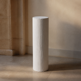 Roma Display Plinth Tall in a warm evening interior