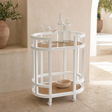 Tesa white timber and natural cane bar cart in a Mediterranean interior