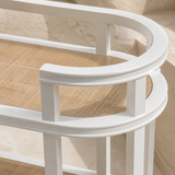 Close-up of Tesa bar cart natural cane weave and white timber rails