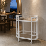 Tesa bar cart in an elegant Mediterranean dining room at blue hour