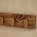 Tessa wooden five-peg wall rail — timber grain detail