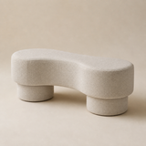 The Elara Padded Bench in a warm beige studio