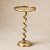 Torino twisted iron side table in a warm beige studio
