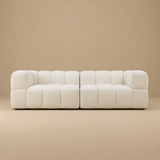 Tribute Shell two-piece sofa in a warm beige studio