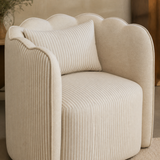 Close-up of the Tullio chair scalloped crown, striped linen and piping