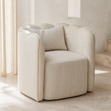 Tullio striped scalloped accent chair in a Mediterranean living room