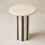 Elevated angle of the Tyra striped cylindrical side table
