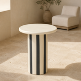 Tyra striped cylindrical side table in a Mediterranean living room