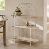 Umbria Natural Oak three-shelf double-arched shelving unit in a warm European lifestyle setting