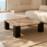Valencia taupe marble and espresso mango wood coffee table in a European coastal living room
