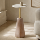 Venetia side table with white marble top, single brass stem and blush fluted pedestal in a premium Mediterranean interior